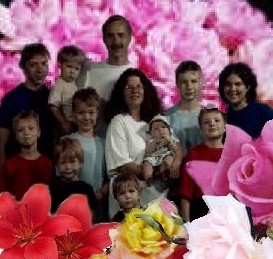 Tim and Terri Palmquist surrounded by their ten blossoming children