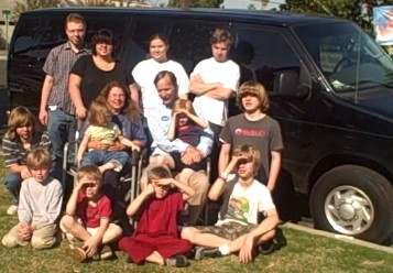 Our family in front of our new van