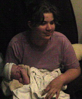 Amy holds Baby Sarah for the first time